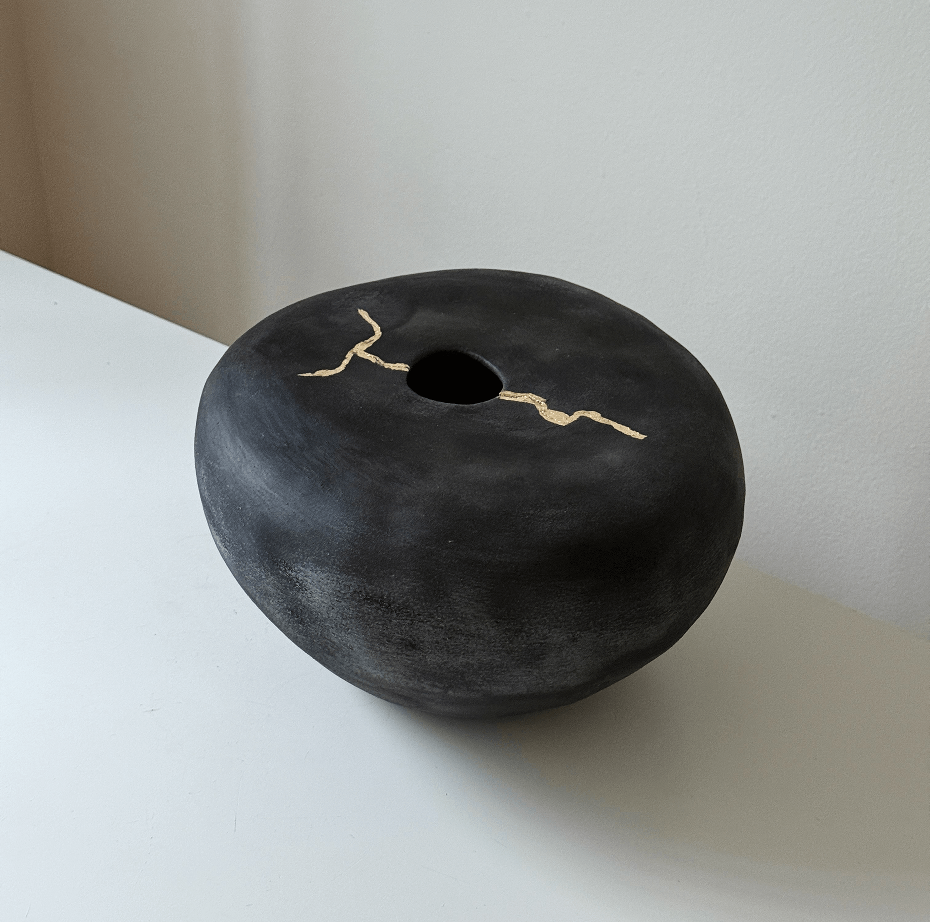Black Vase in Gold
